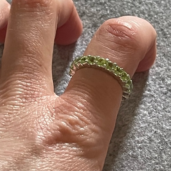 925 Sterling silver eternity ring band, possibly peridot.